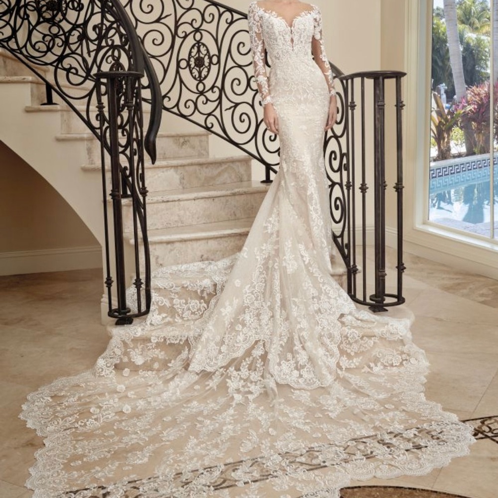 Lace wedding dress. Gorgeous back with a long train.